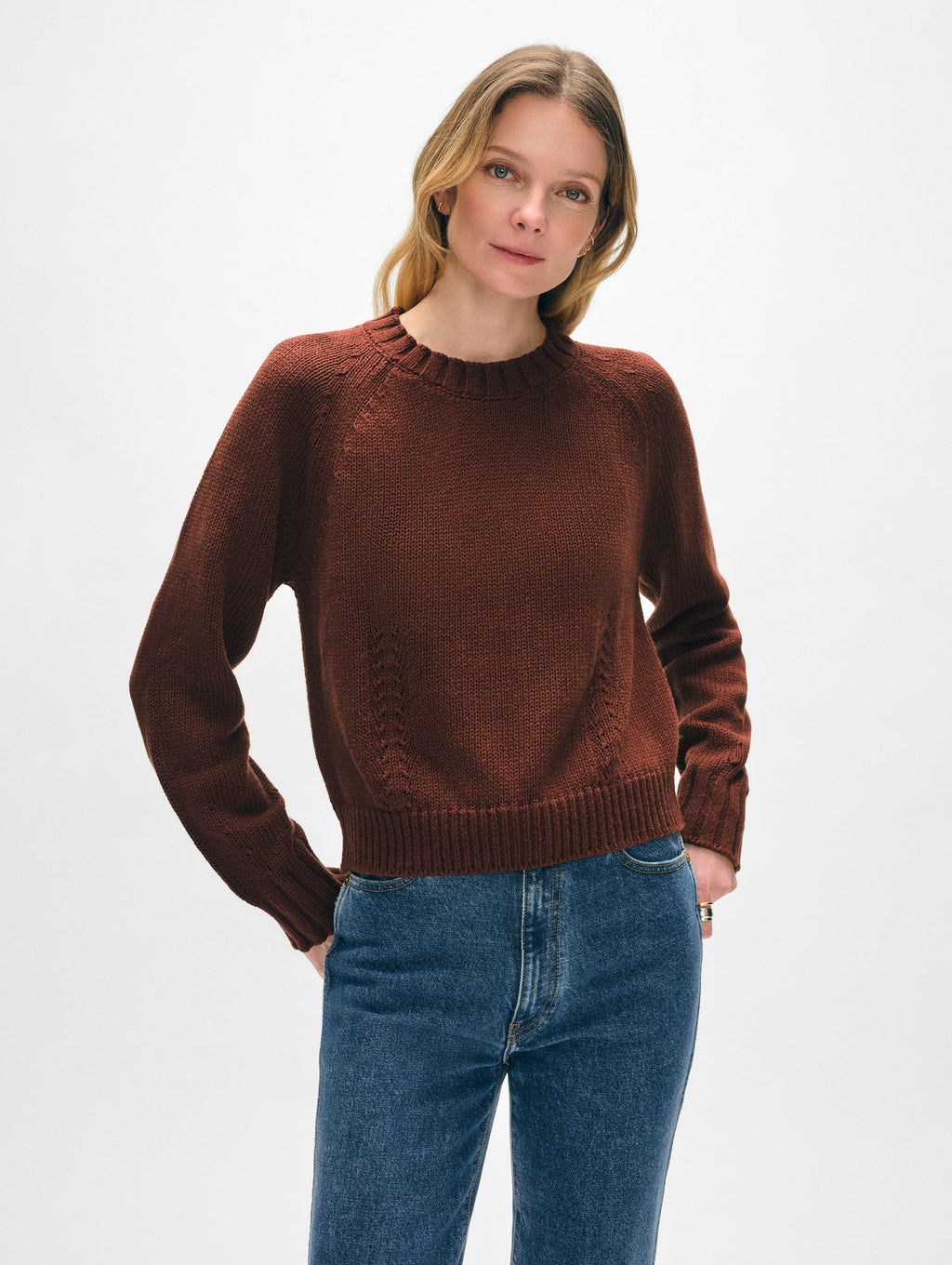 Model wearing deep red cotton crewneck sweater.