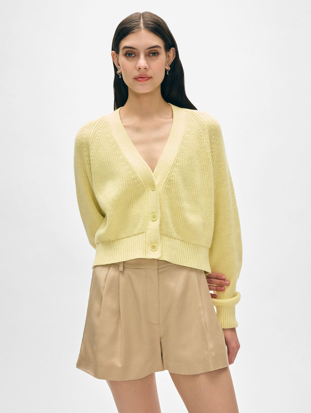 Model wearing yellow cotton button cardigan.